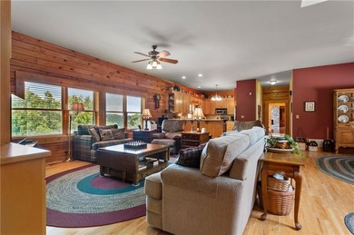 Welcome home to this custom builder's retreat with metal roof &