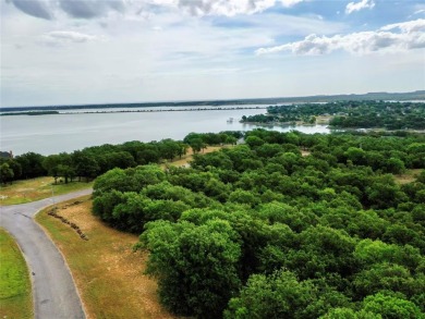 Spacious 1.69 acre corner lot with breathtaking lake views of - Lake Lot For Sale in Runaway Bay, Texas