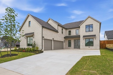 Popular open concept home features a dramatic two-story entry - photo 1