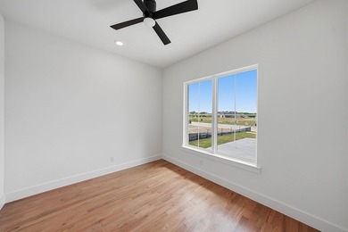 Popular open concept home features a dramatic two-story entry - photo 5