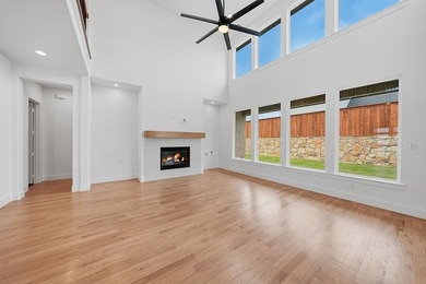 Popular open concept home features a dramatic two-story entry - photo 8