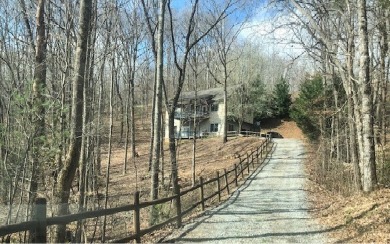 PRIVATELY LOCATED ON NEARLY 3 BEAUTIFULLY WOODED ACRES A - Lake Home For Sale in Hayesville, North Carolina