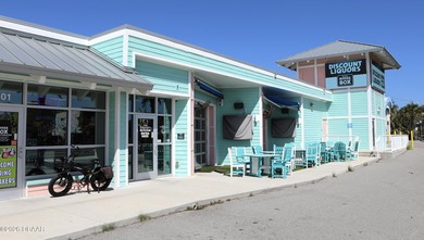 Businesses and real estate with the vacant lot across Peninsula - photo 1