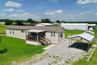 Welcome to lake living in the desirable Belle Starr Addition on - photo 1
