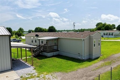 Welcome to lake living in the desirable Belle Starr Addition on - photo 5