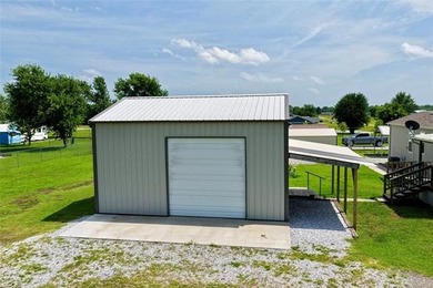 Welcome to lake living in the desirable Belle Starr Addition on - photo 6