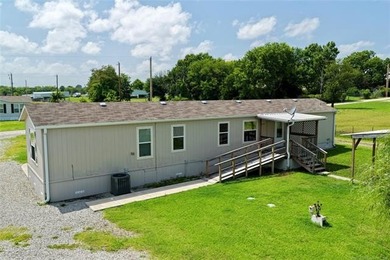Welcome to lake living in the desirable Belle Starr Addition on - photo 9