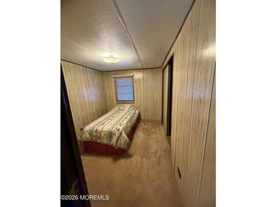 Quiet serenity is what you will find at this home, snuggled up - photo 17