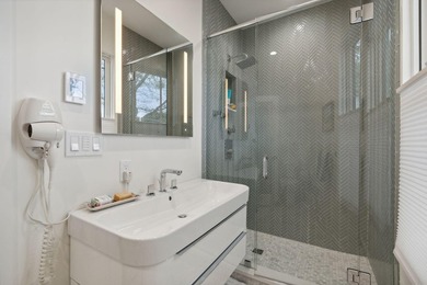 This redesigned downtown three-unit is a rare gem--where - photo 22