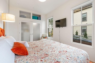 This redesigned downtown three-unit is a rare gem--where - photo 33