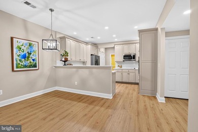 Welcome home to this newly refreshed, bright, cheerful end unit - photo 9