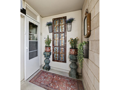 This corner-unit condo offers a perfect blend of modern luxury - photo 2