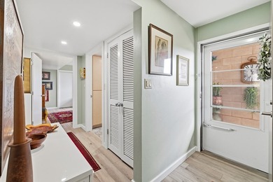 This corner-unit condo offers a perfect blend of modern luxury - photo 3