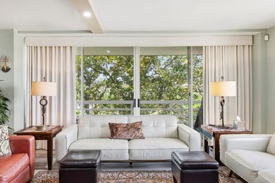 This corner-unit condo offers a perfect blend of modern luxury - photo 5