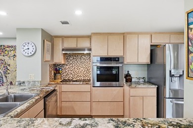 This corner-unit condo offers a perfect blend of modern luxury - photo 10