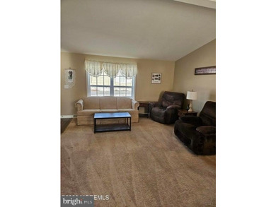 Welcome home to the Manasquan model in Perry's Lake! Upon - photo 22