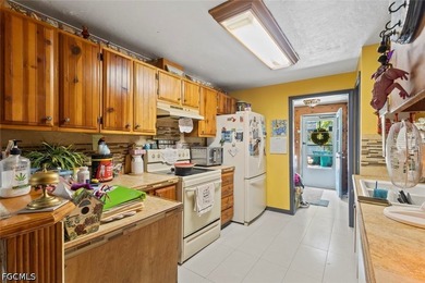 Experience the rare combination of 2.28 acres on a freshwater - photo 11