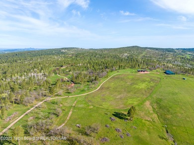 The 2,238 deeded acre ranch is located about 8 miles NW of - photo 3