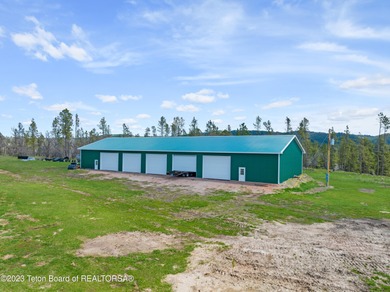The 2,238 deeded acre ranch is located about 8 miles NW of - photo 6