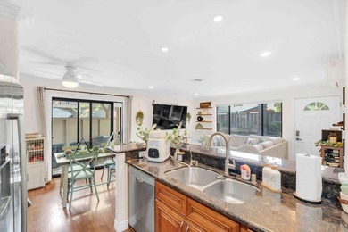 The Best Location in the Community! Light & Bright End Unit with - photo 11