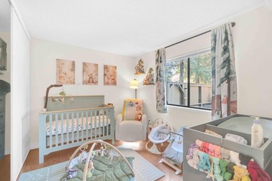 The Best Location in the Community! Light & Bright End Unit with - photo 14