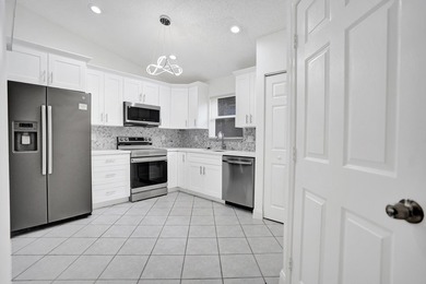 Welcome to your beautifully renovated retreat in the highly - photo 24