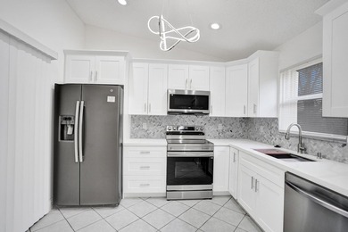 Welcome to your beautifully renovated retreat in the highly - photo 26
