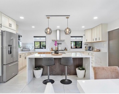 This is a SHORT SALE! Gorgeous Hollywood Lakes Home 4/3.5 w pool - photo 8