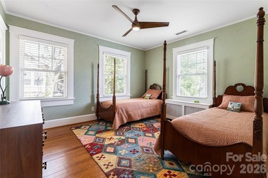 There is a warm, inviting grace to this Grove Park home that - photo 12