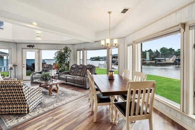 This extraordinary lakefront retreat is a true architectural gem