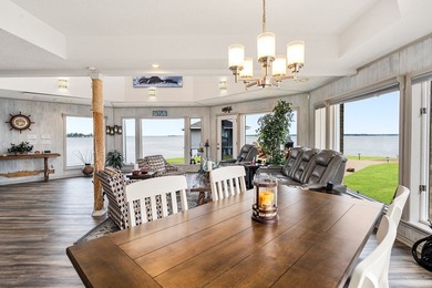 This extraordinary lakefront retreat is a true architectural gem