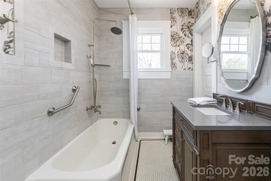 There is a warm, inviting grace to this Grove Park home that - photo 15