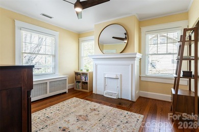 There is a warm, inviting grace to this Grove Park home that - photo 17