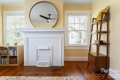 There is a warm, inviting grace to this Grove Park home that - photo 18