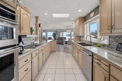 This extraordinary lakefront retreat is a true architectural gem