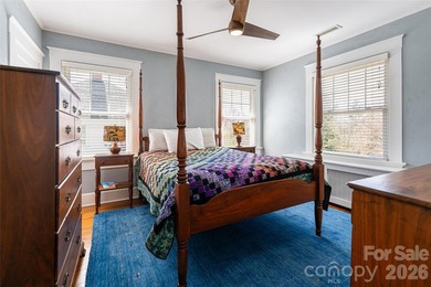There is a warm, inviting grace to this Grove Park home that - photo 19