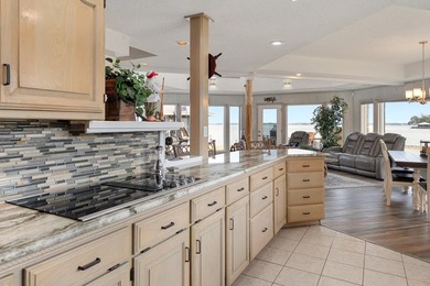 This extraordinary lakefront retreat is a true architectural gem