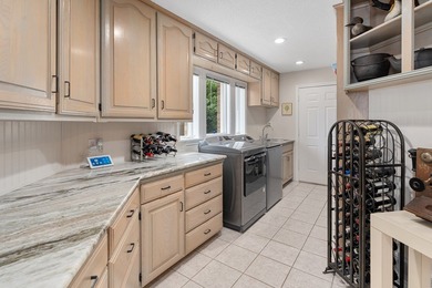 This extraordinary lakefront retreat is a true architectural gem