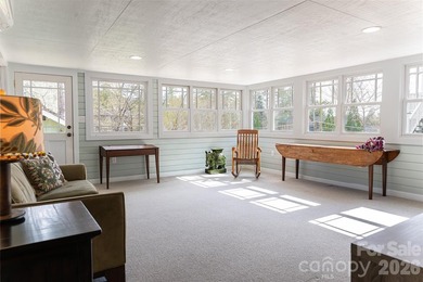 There is a warm, inviting grace to this Grove Park home that - photo 27
