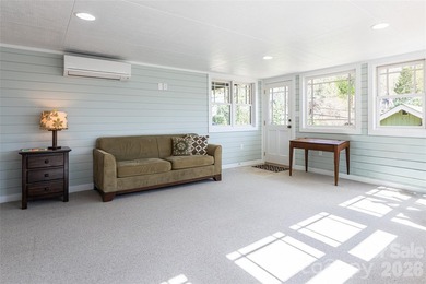 There is a warm, inviting grace to this Grove Park home that - photo 29