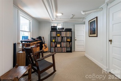 There is a warm, inviting grace to this Grove Park home that - photo 32