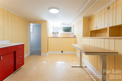 There is a warm, inviting grace to this Grove Park home that - photo 33