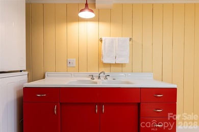 There is a warm, inviting grace to this Grove Park home that - photo 34
