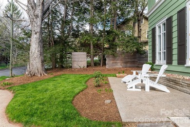 There is a warm, inviting grace to this Grove Park home that - photo 36