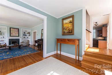 There is a warm, inviting grace to this Grove Park home that - photo 40