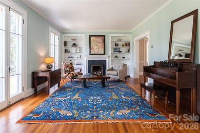 There is a warm, inviting grace to this Grove Park home that - photo 42