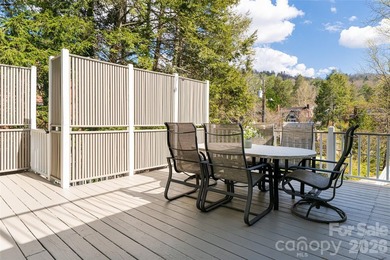 There is a warm, inviting grace to this Grove Park home that - photo 43