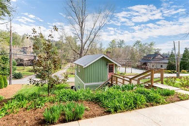 There is a warm, inviting grace to this Grove Park home that - photo 47