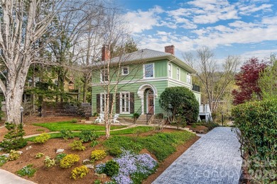 There is a warm, inviting grace to this Grove Park home that - photo 48