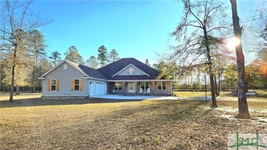 Lake Home For Sale in Ellabell, Georgia